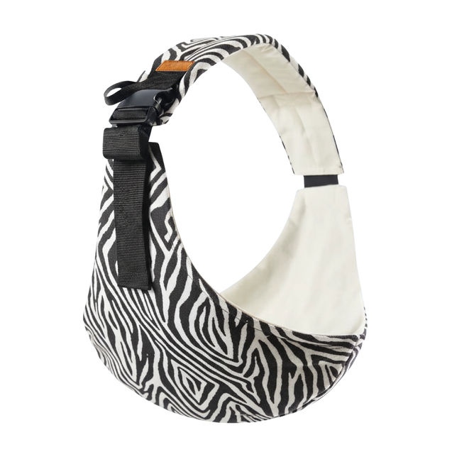 baby sling carrier with zebra pattern and white interior on a white background